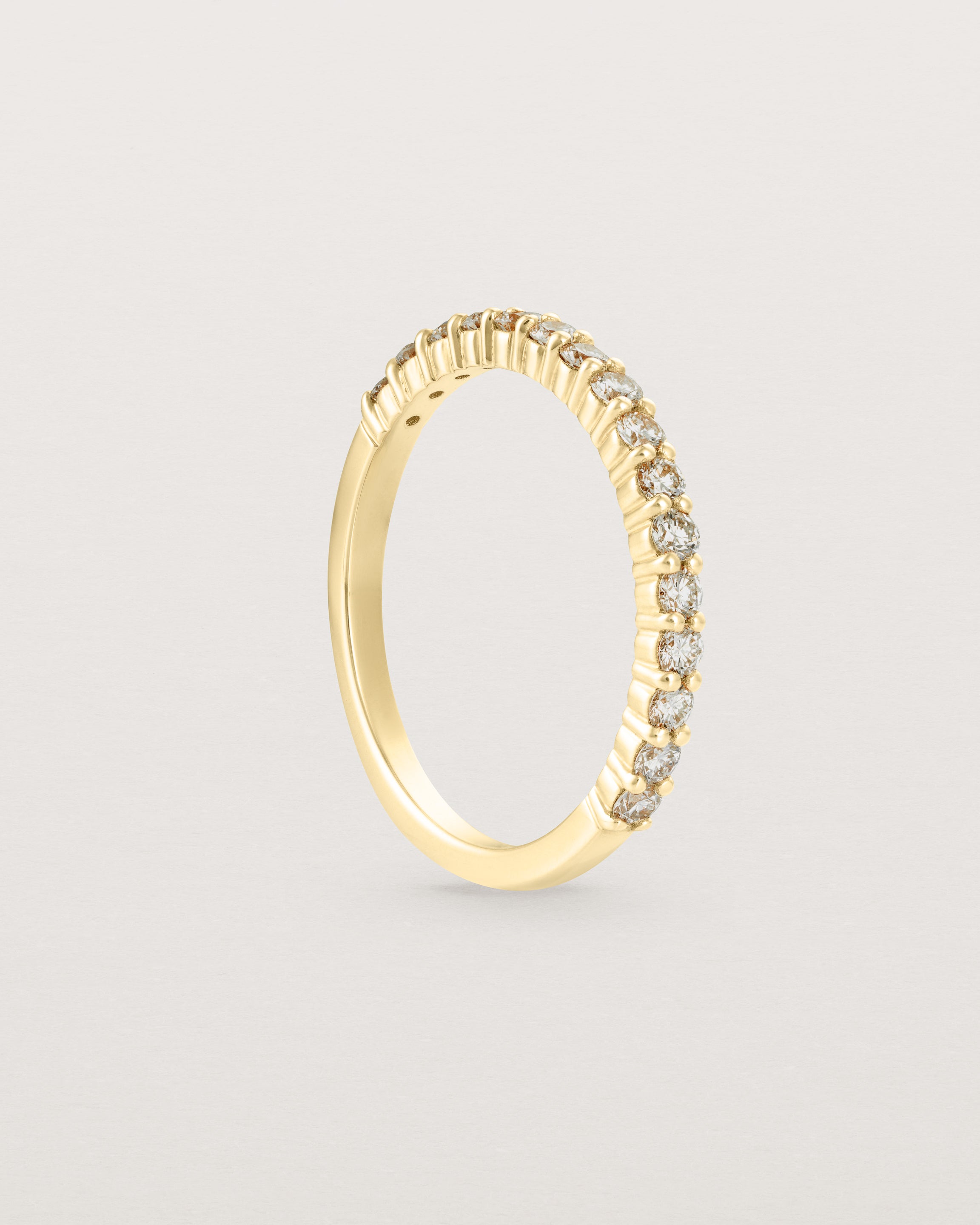 Standing view of the Demi Grace Ring | Champagne Diamonds in yellow gold.