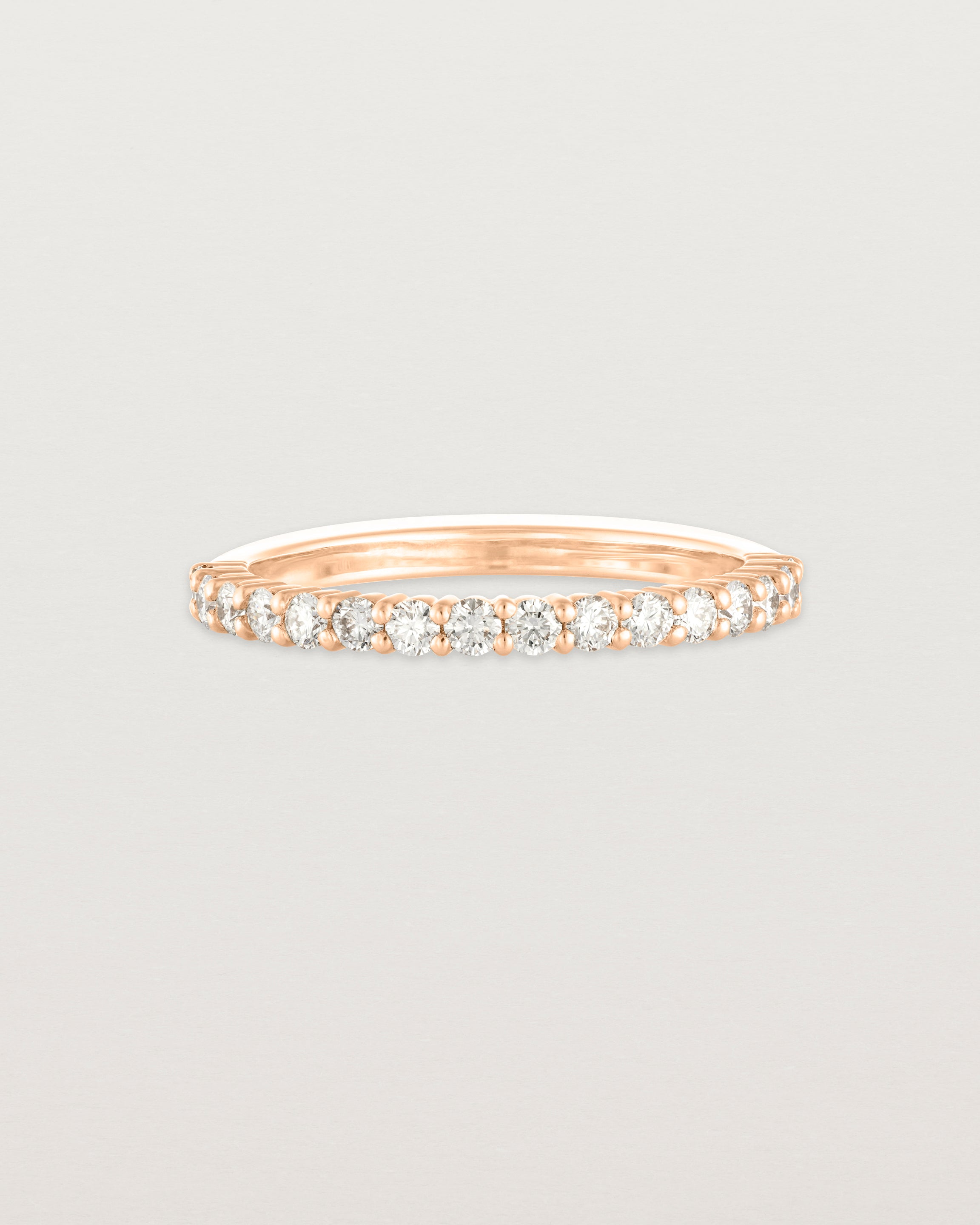 Angled view of the Demi Grace Ring | White Diamonds in rose gold.