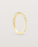 Standing view of the Demi Grace Ring | White Diamonds in yellow gold.