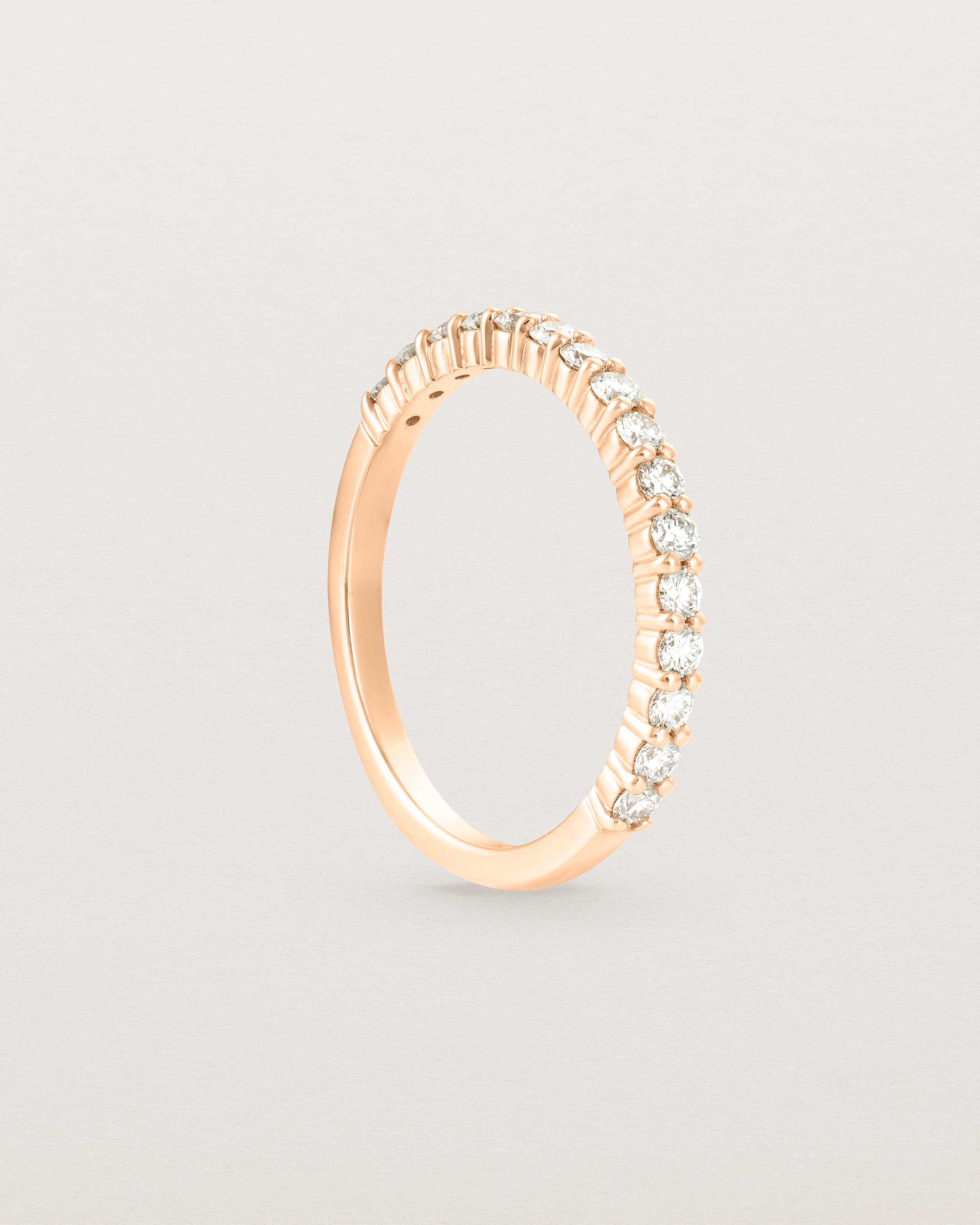 Standing view of the Demi Grace Ring | White Diamonds in rose gold.