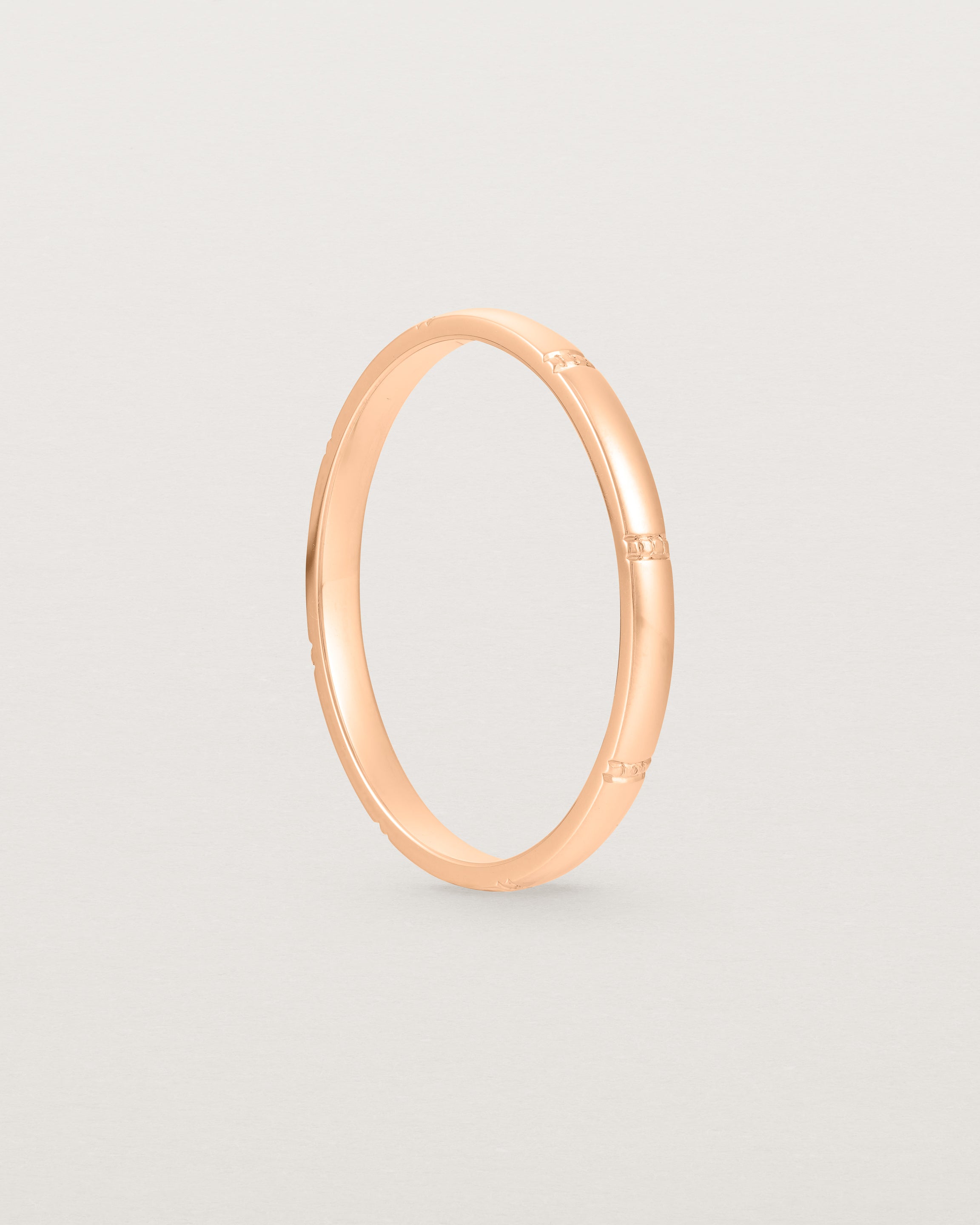 Standing view of the Grain Wedding Ring | 2mm | Rose Gold.