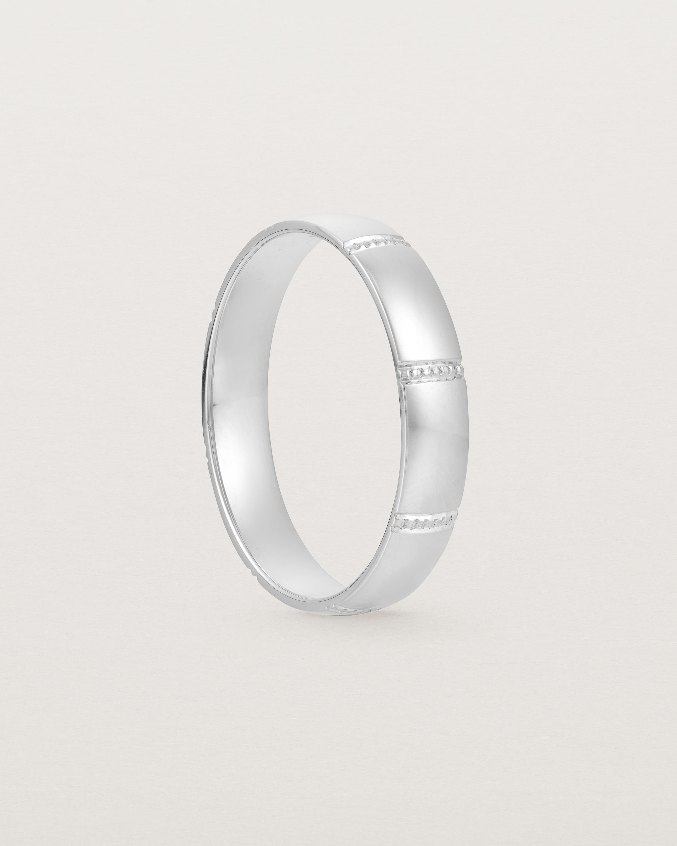 Standing view of the Grain Wedding Ring | 4mm | White Gold.