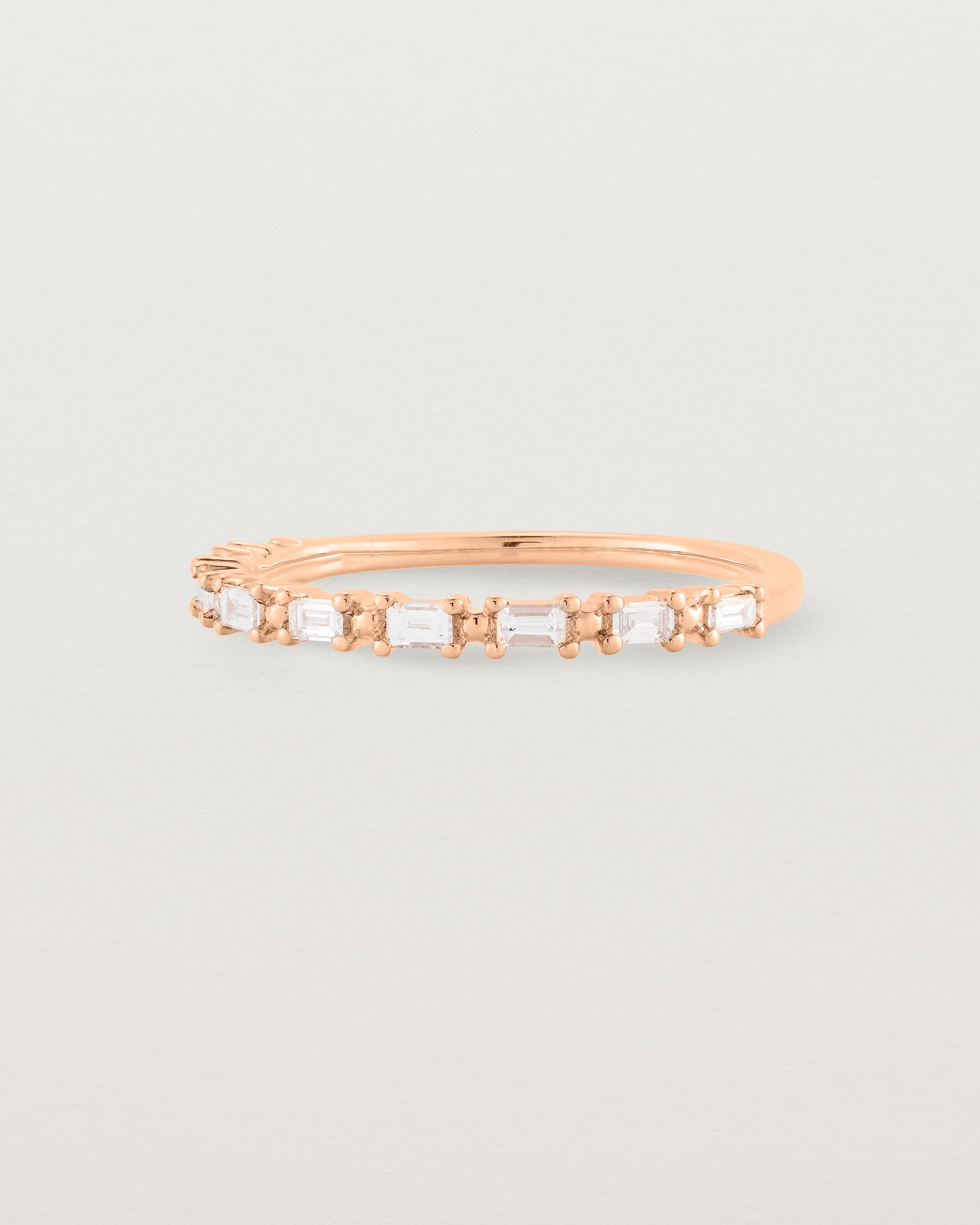 Angled view of the Demi Khyati Ring | Diamonds in Rose Gold.