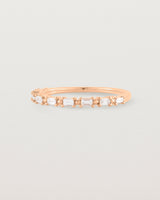 Angled view of the Demi Khyati Ring | Diamonds in Rose Gold.