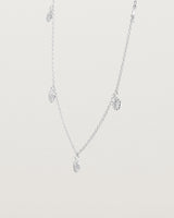 Angled view of the Jia Charm Necklace | Sterling Silver.