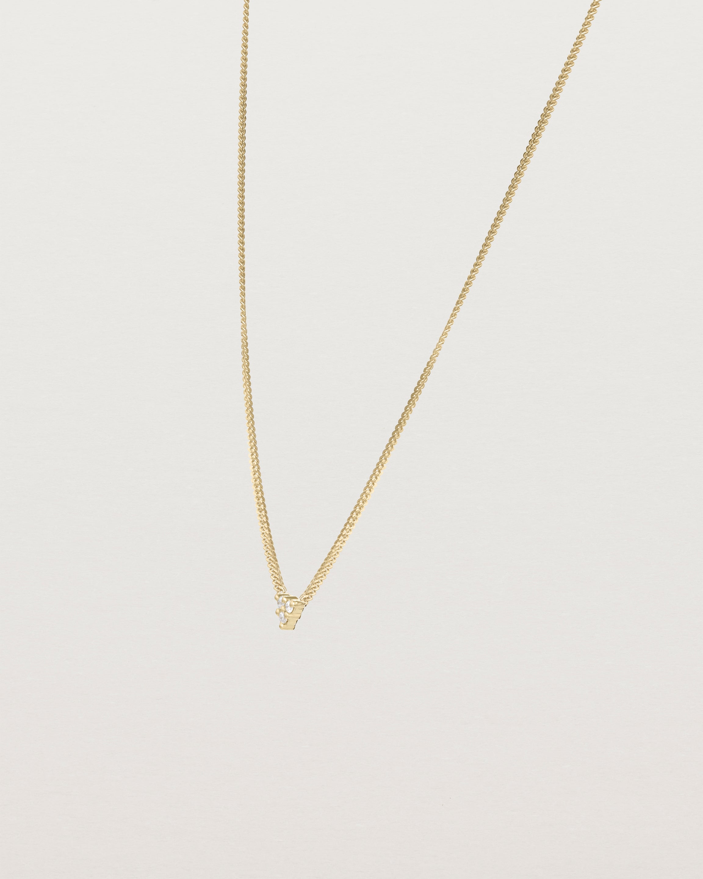 Angled view of the Kalani Necklace | Diamonds in yellow gold.