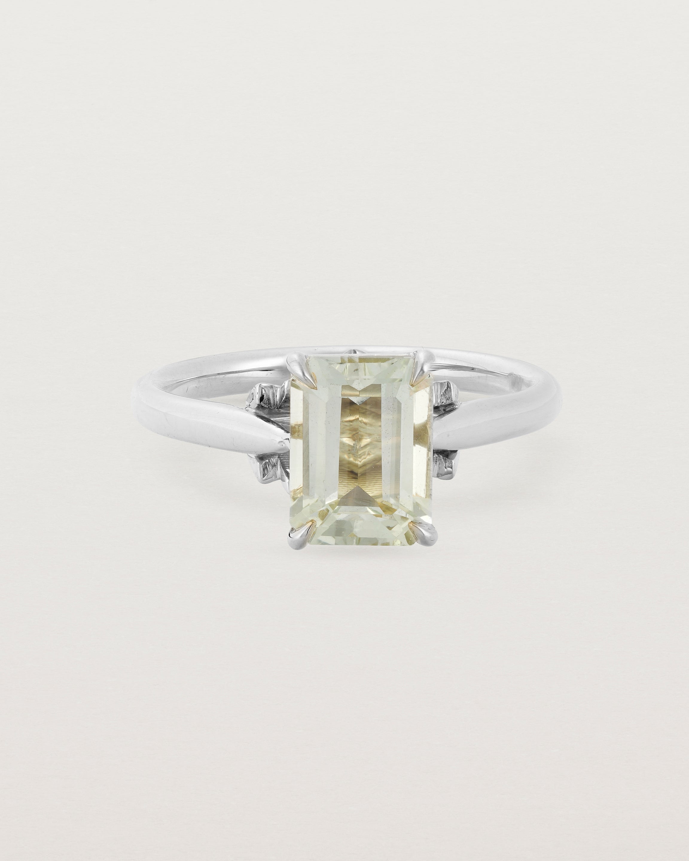 Front view of the Front view of the Kalina Emerald Solitaire | Green Amethyst | White Gold.