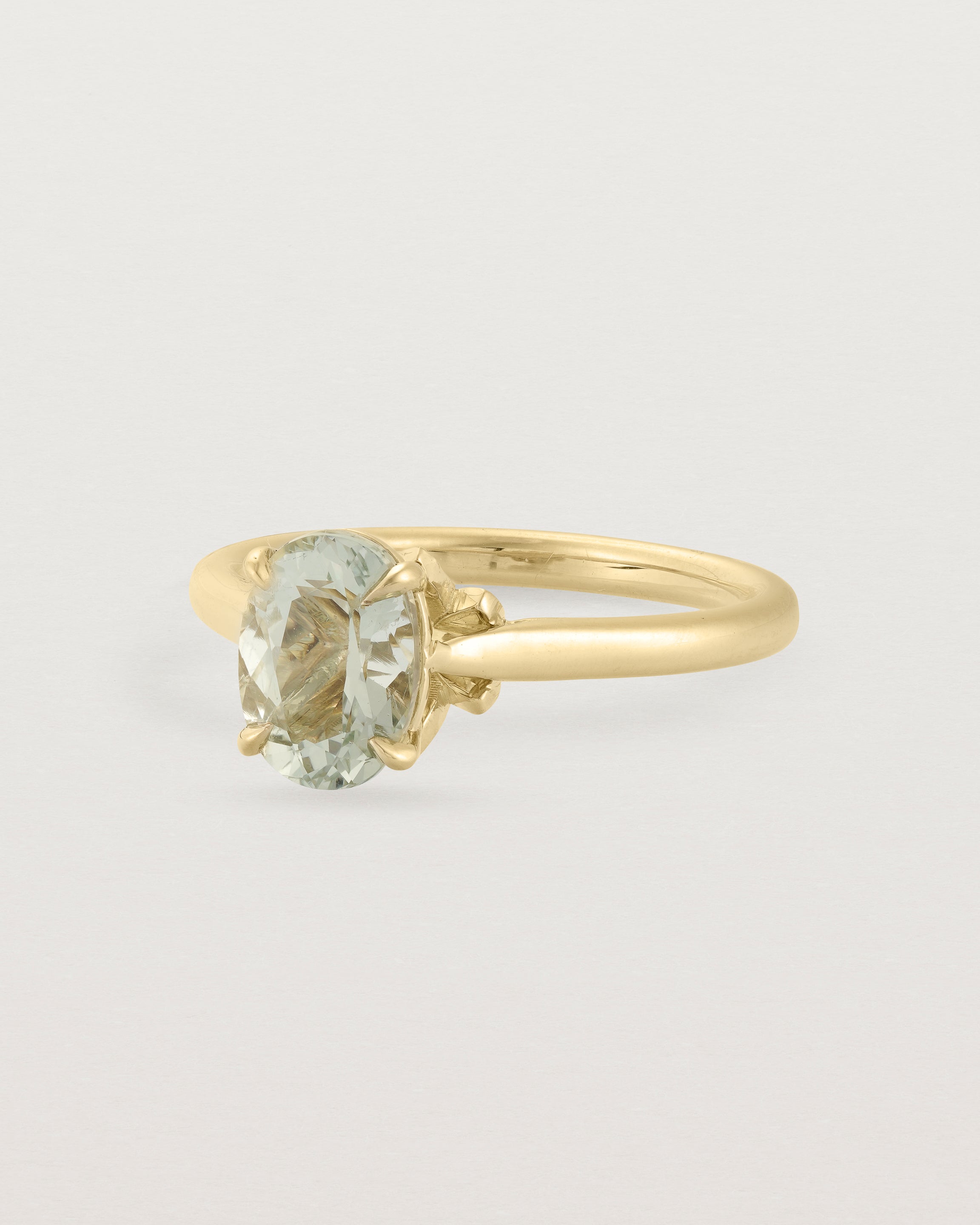 Angled view of the Kalina Oval Solitaire | Green Amethyst | Yellow Gold.