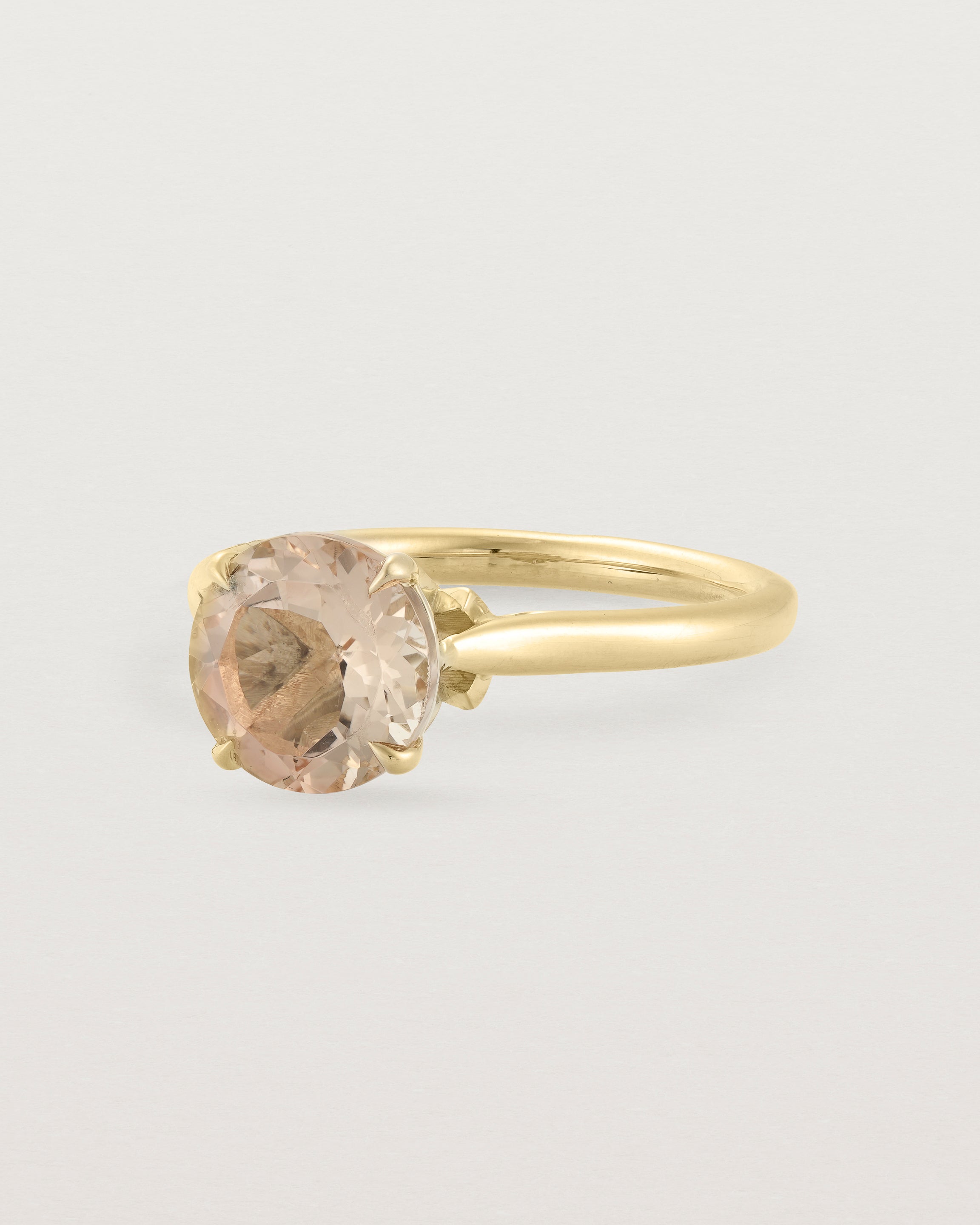 Angled view of the Kalina Round Solitaire | Savannah Sunstone | Yellow Gold.