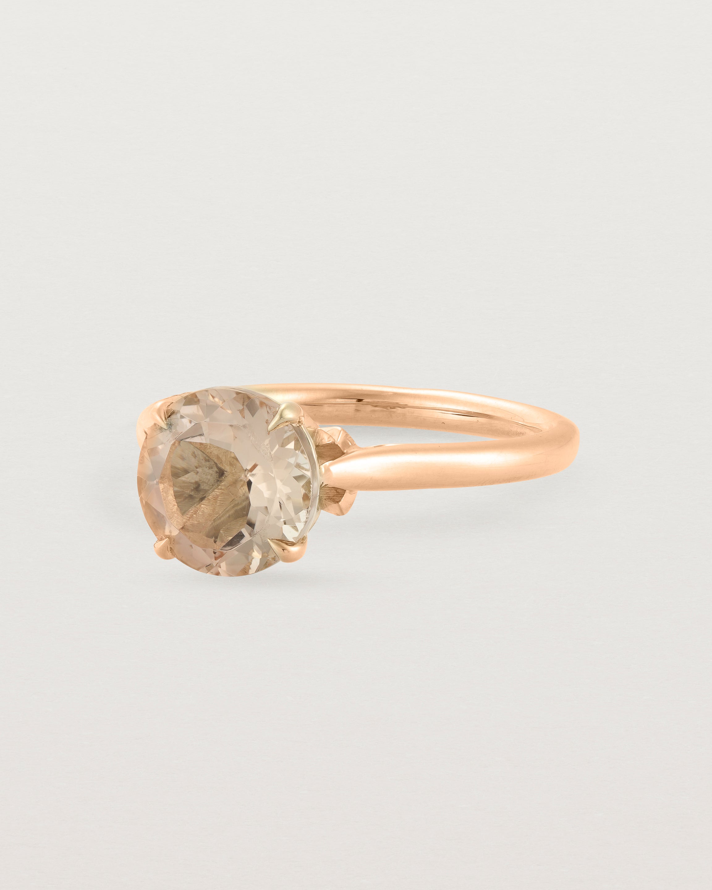 Angled view of the Kalina Round Solitaire | Savannah Sunstone | Rose Gold.