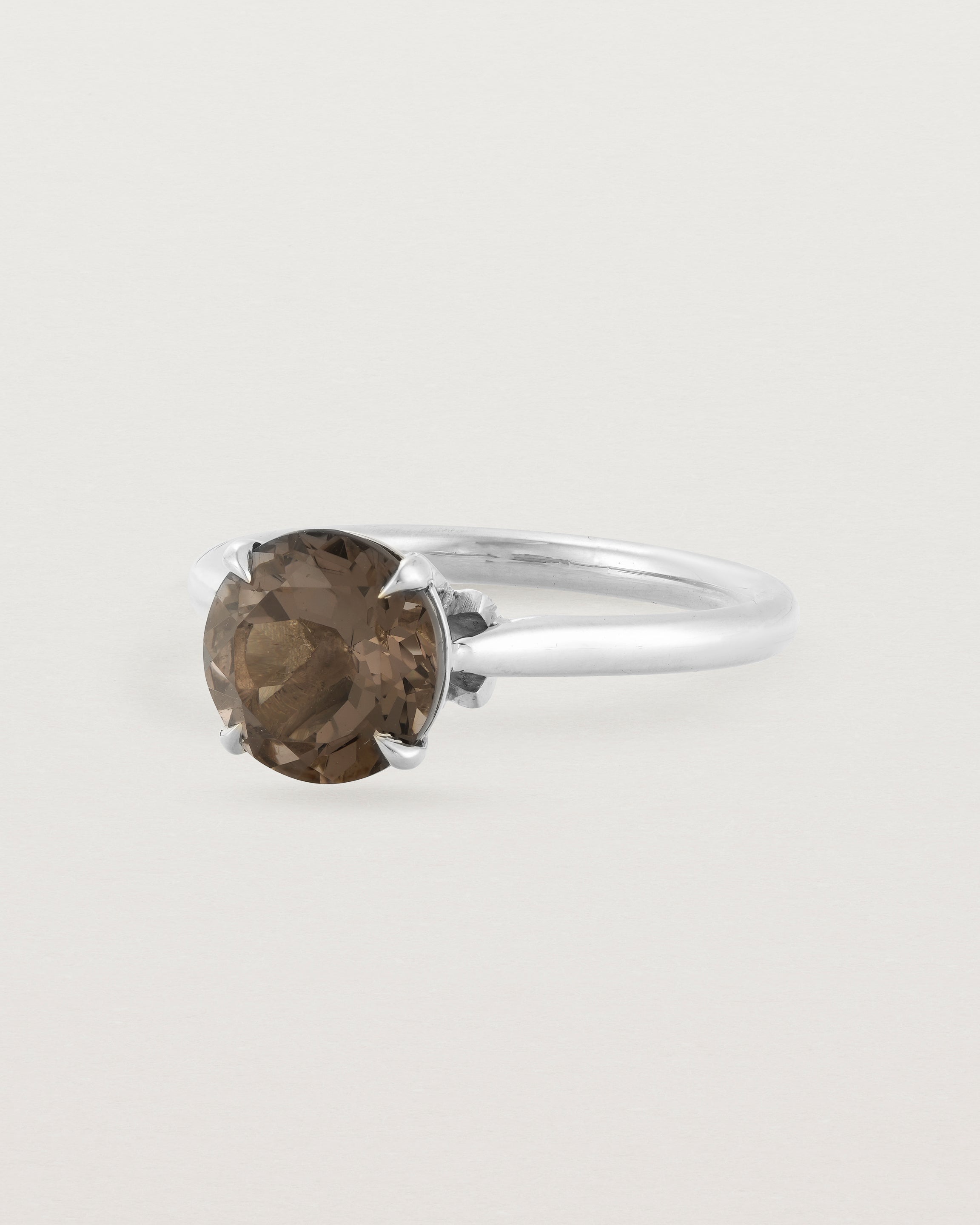 Angled view of the Kalina Round Solitaire | Smokey Quartz | White Gold