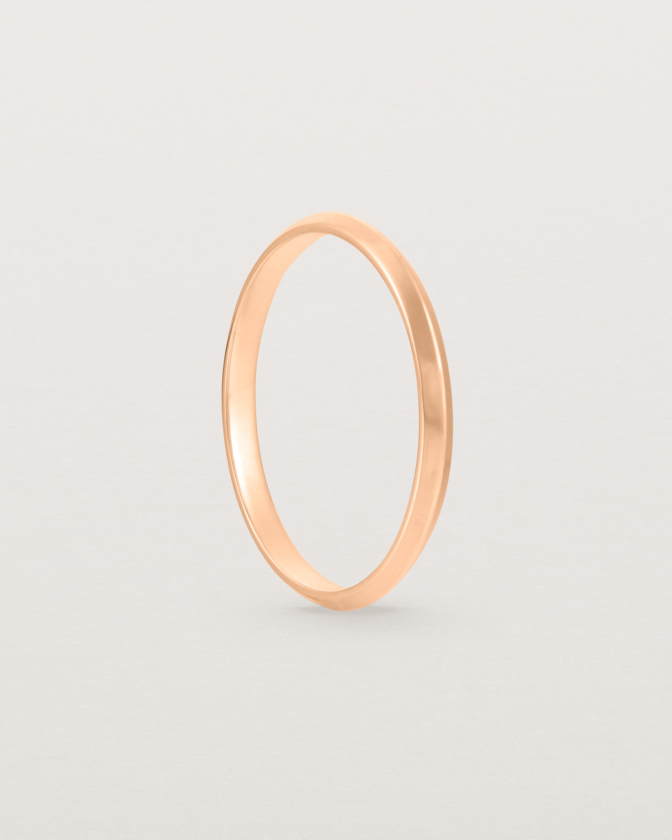 Standing view of the Knife Edge Wedding Ring | 2mm | Rose Gold.