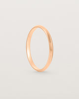 Standing view of the Knife Edge Wedding Ring | 2mm | Rose Gold.