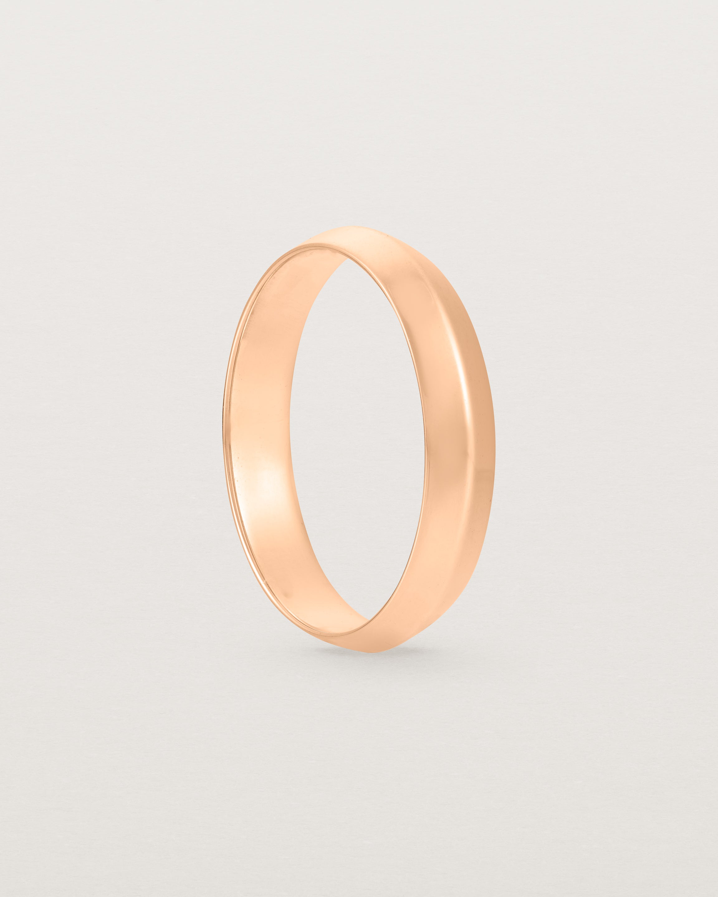 Standing view of the Knife Edge Wedding Ring | 4mm | Rose Gold.