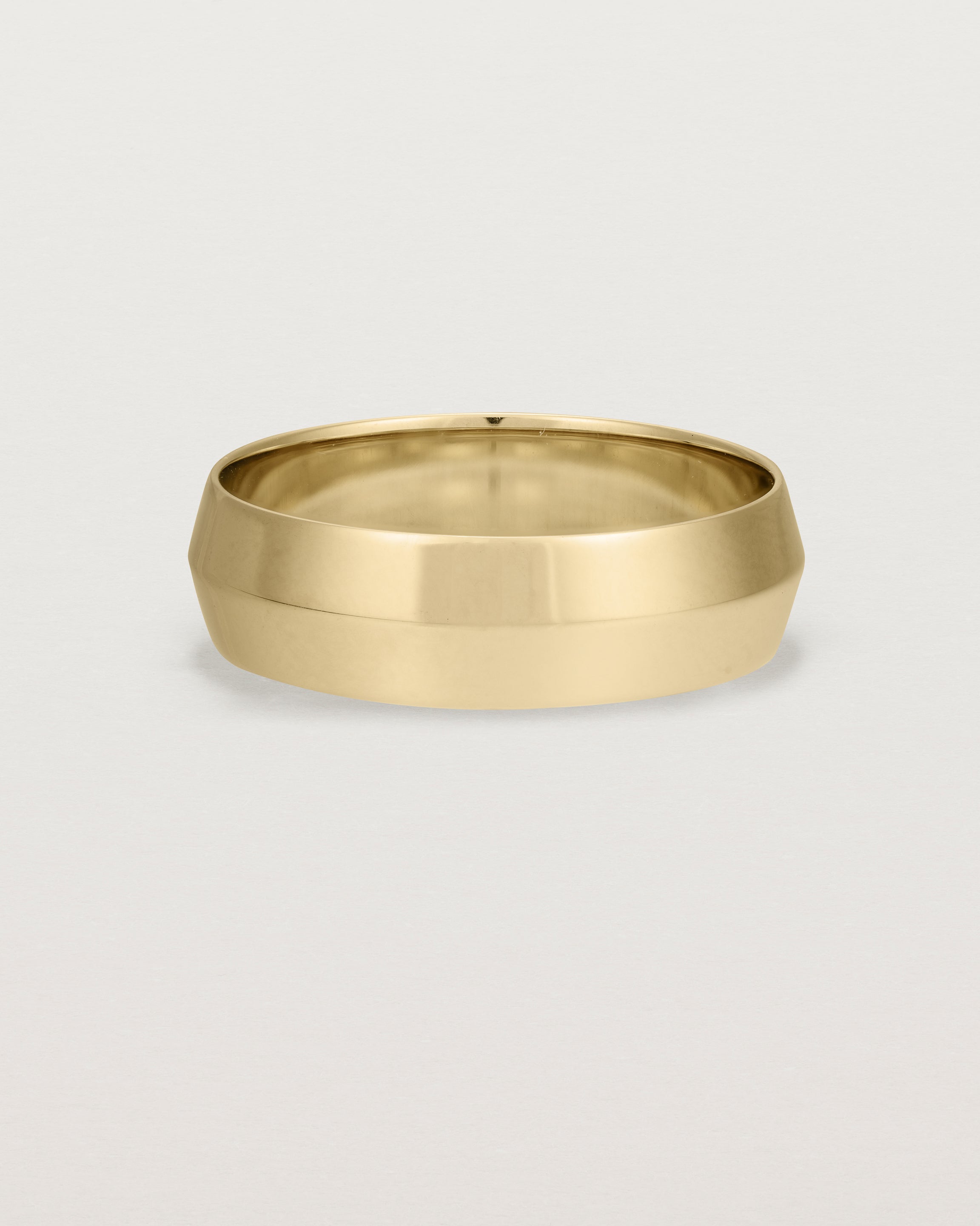 Front view of the Knife Edge Wedding Ring | 6mm | Yellow Gold.