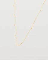 Angled view of the Lai Chain Necklace in yellow gold.