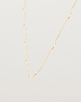 Angled view of the Lai Chain Necklace in rose gold.
