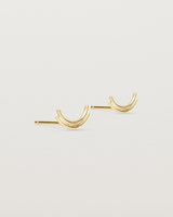 Angled view of the Lai Studs in yellow gold.