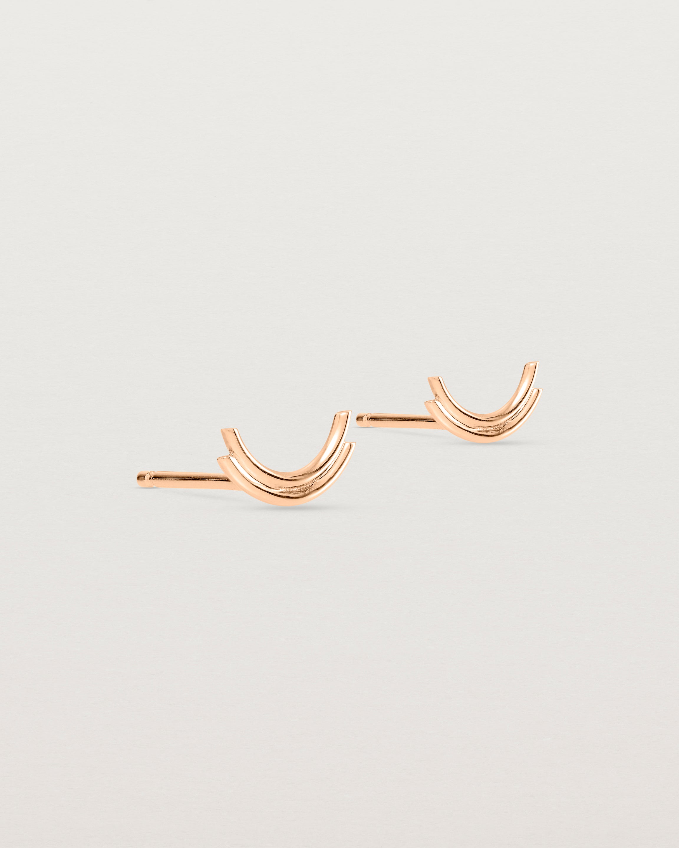Angled view of the Lai Studs in rose gold.