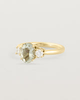 Angled view of the Laurel Oval Trio Ring | Green Amethyst | Yellow Gold.