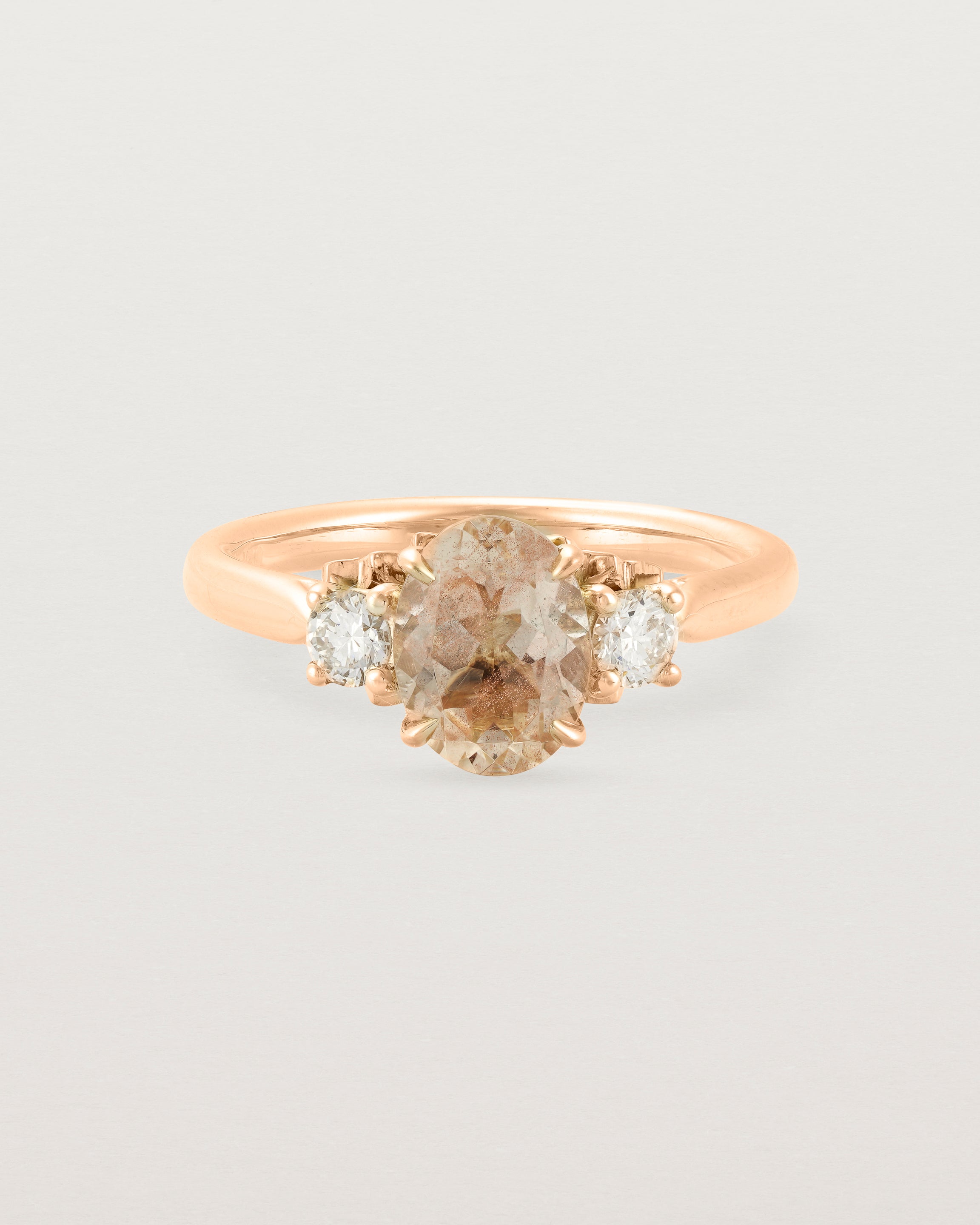 Front view of the Laurel Oval Trio Ring | Savannah Sunstone | Rose Gold.