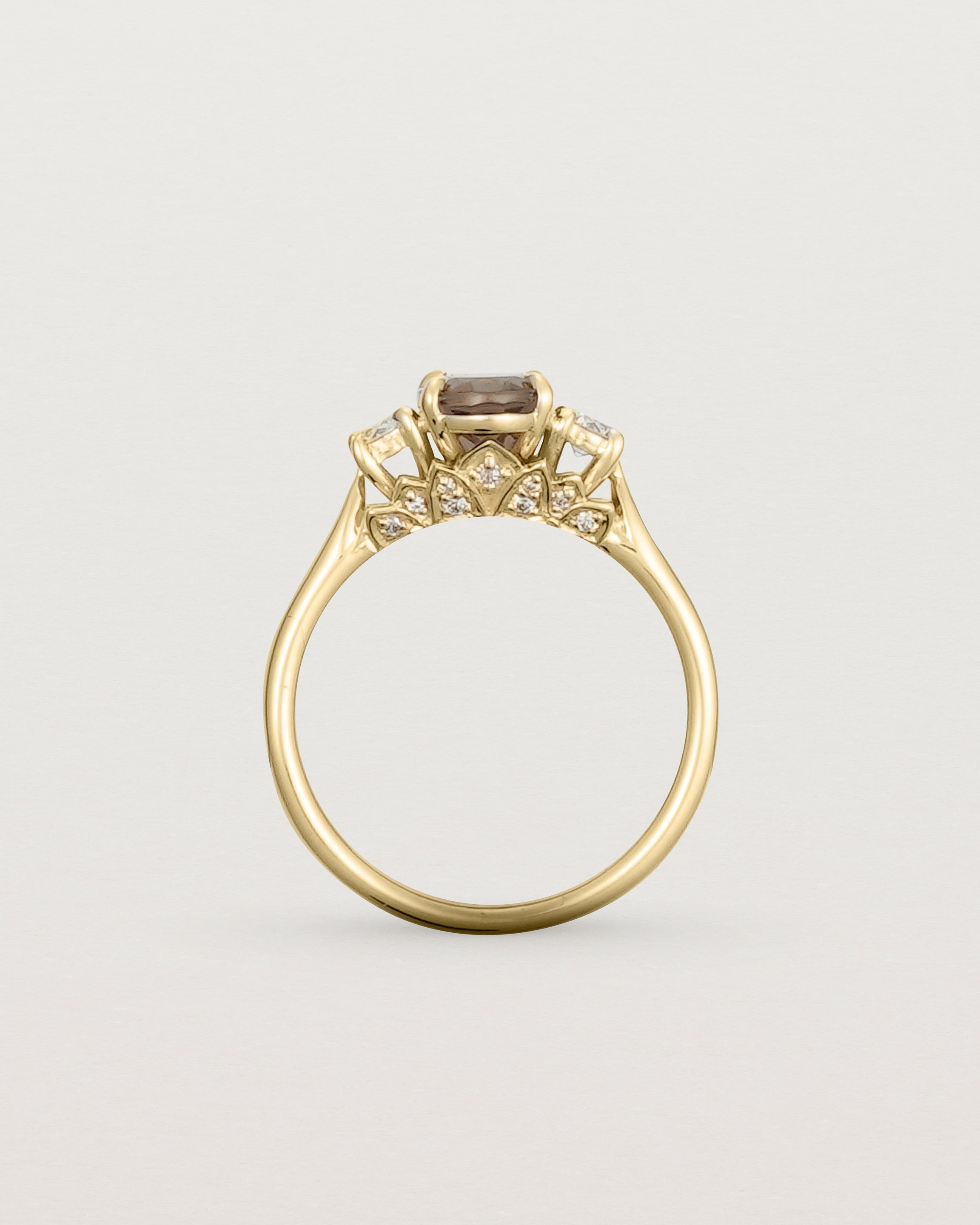 Standing view of the Laurel Oval Trio Ring | Smokey Quartz | Yellow Gold.