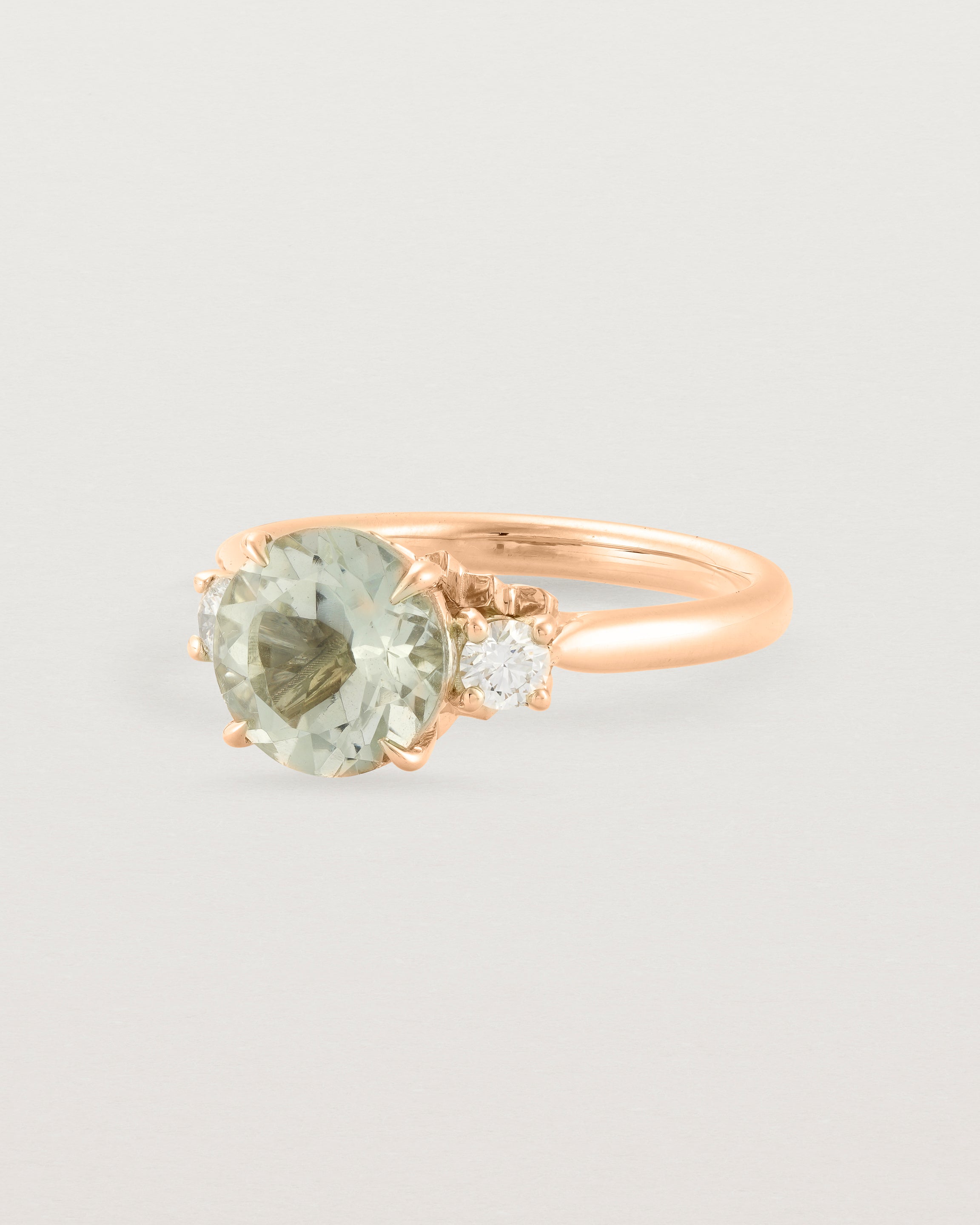 Angled view of the Laurel Round Trio Ring | Green Amethyst | Rose Gold.