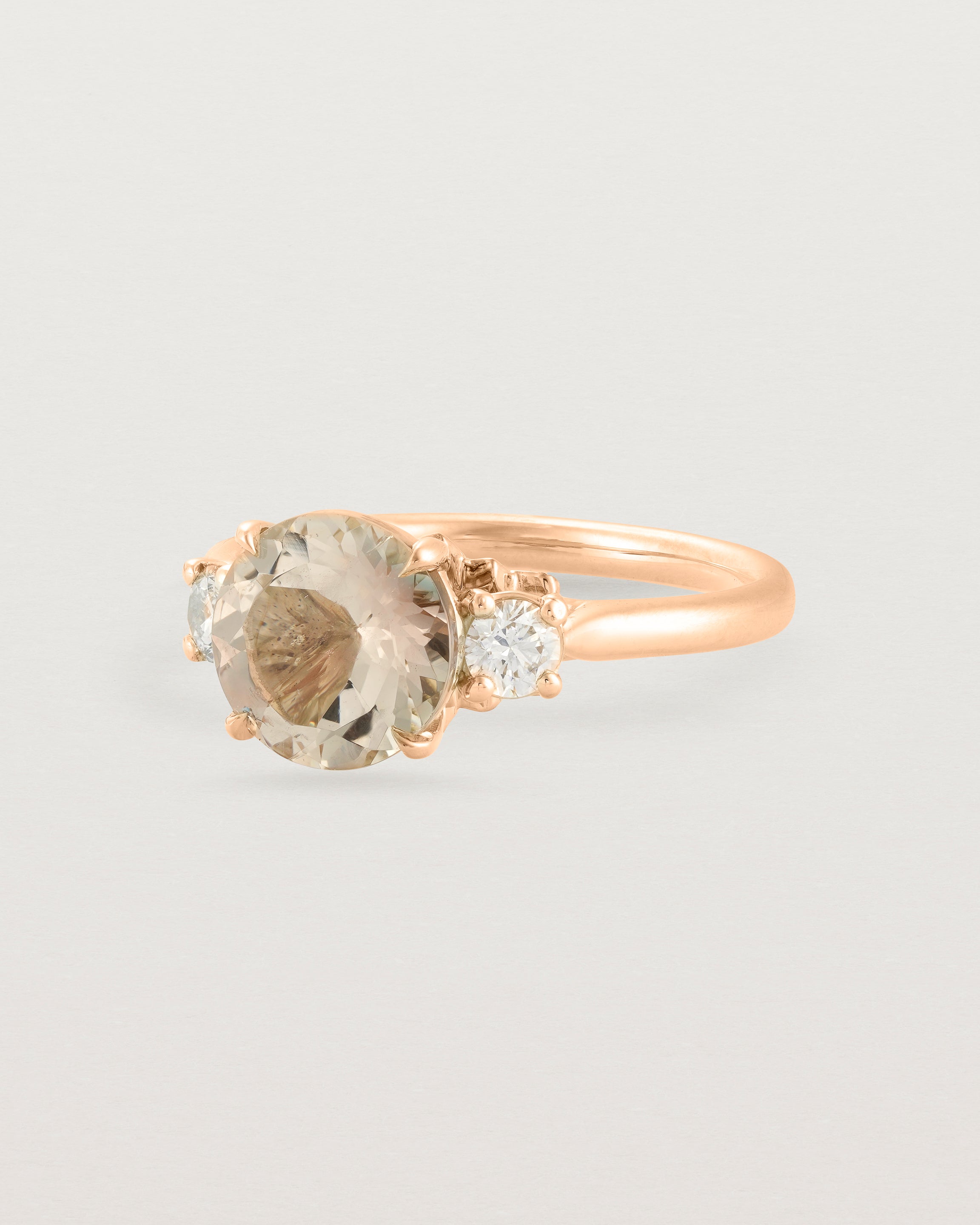 Angled view of the Laurel Round Trio Ring | Savannah Sunstone | Rose Gold.
