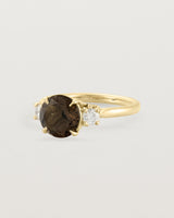 Angled view of the Laurel Round Trio Ring | Smokey Quartz | Yellow Gold.