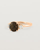 Angled view of the Laurel Round Trio Ring | Smokey Quartz | Rose Gold.