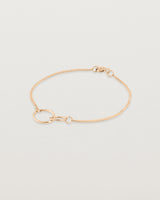 side view of the loop through oval bracelet in rose gold