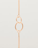 close up view of the loop through oval bracelet in rose gold