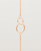 close up view of the loop through oval bracelet in rose gold