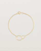 top view of the loop through oval bracelet in yellow  gold
