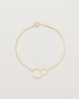 top view of the loop through oval bracelet in yellow  gold