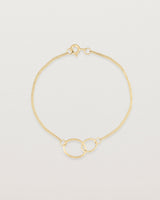 top view of the loop through oval bracelet in yellow  gold