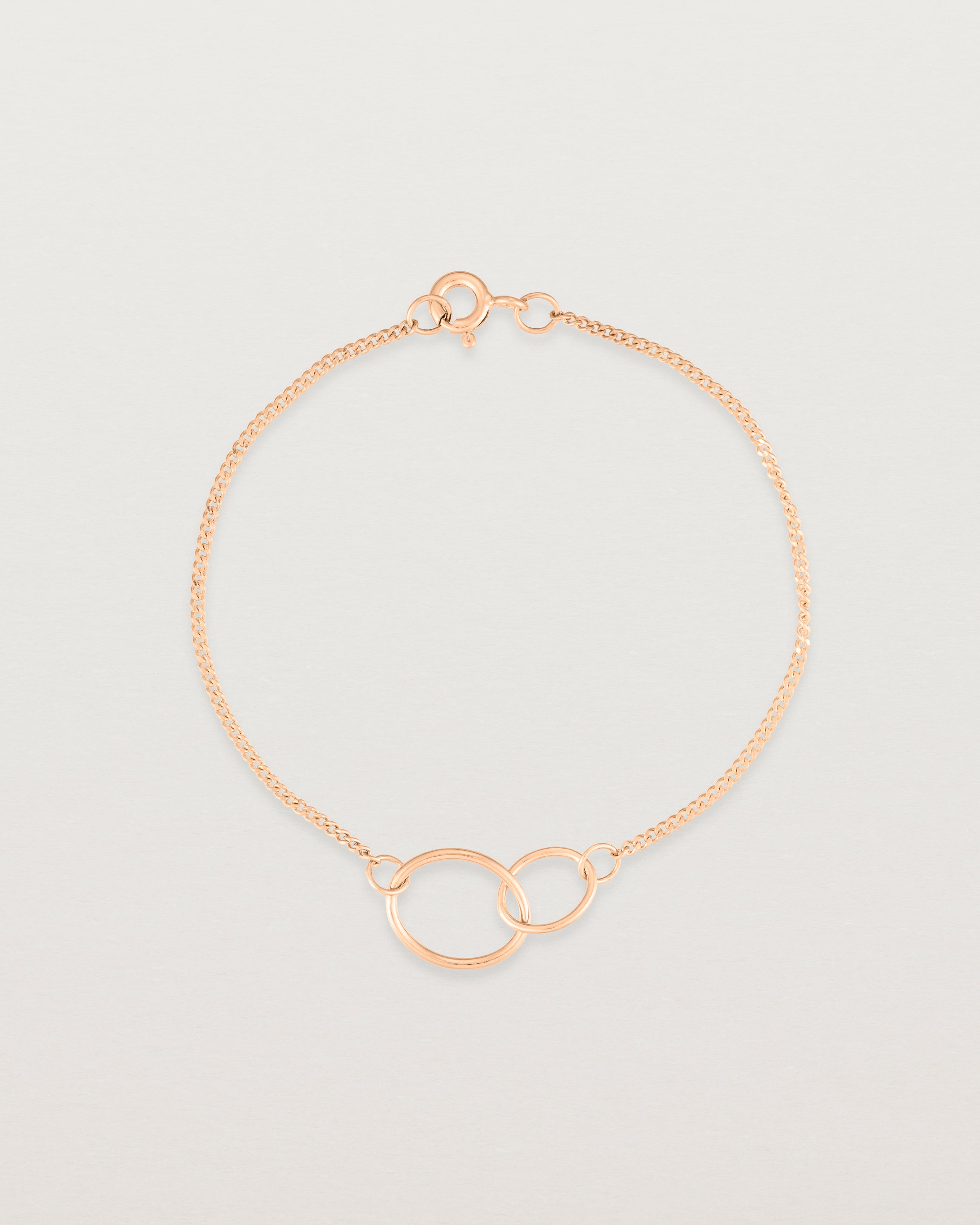 top view of the loop through oval bracelet in rose gold