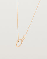 two circles interlinking on a rose gold necklace