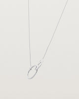 two circles interlinking on a white gold necklace