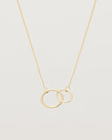 two circles interlinking on a yellow gold necklace