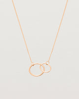 two circles interlinking on a rose gold necklace