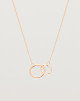 two circles interlinking on a rose gold necklace