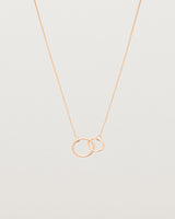 two circles interlinking on a rose gold necklace