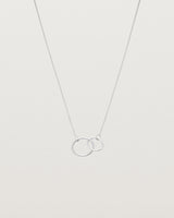 two circles interlinking on a white gold necklace