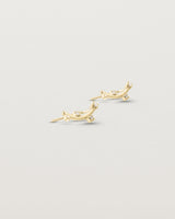 Angled view of the Lyra Earrings | Diamond in yellow gold.