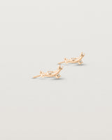 Angled view of the Lyra Earrings | Diamond in rose gold.