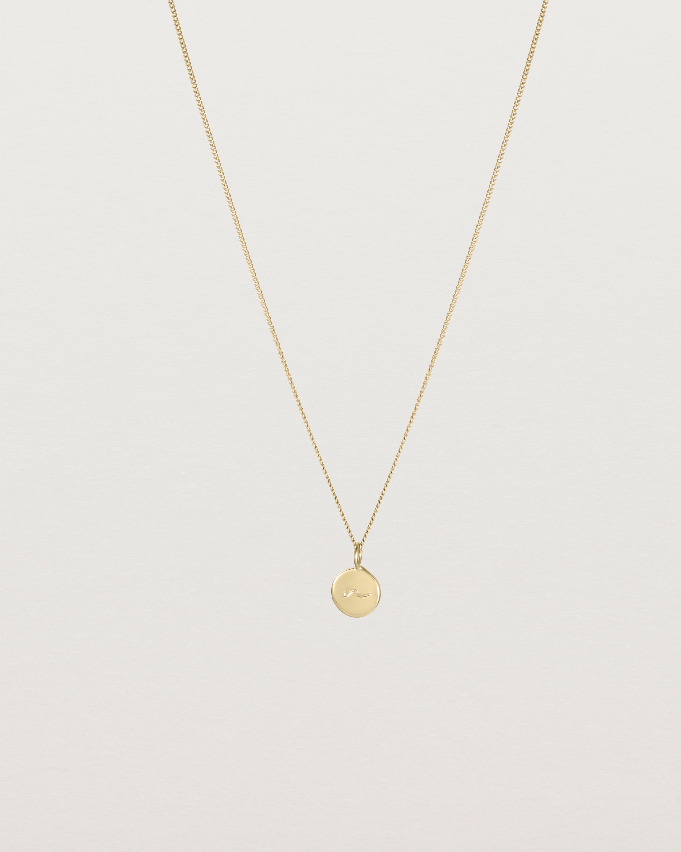 Front view of the Mae Necklace in yellow gold.