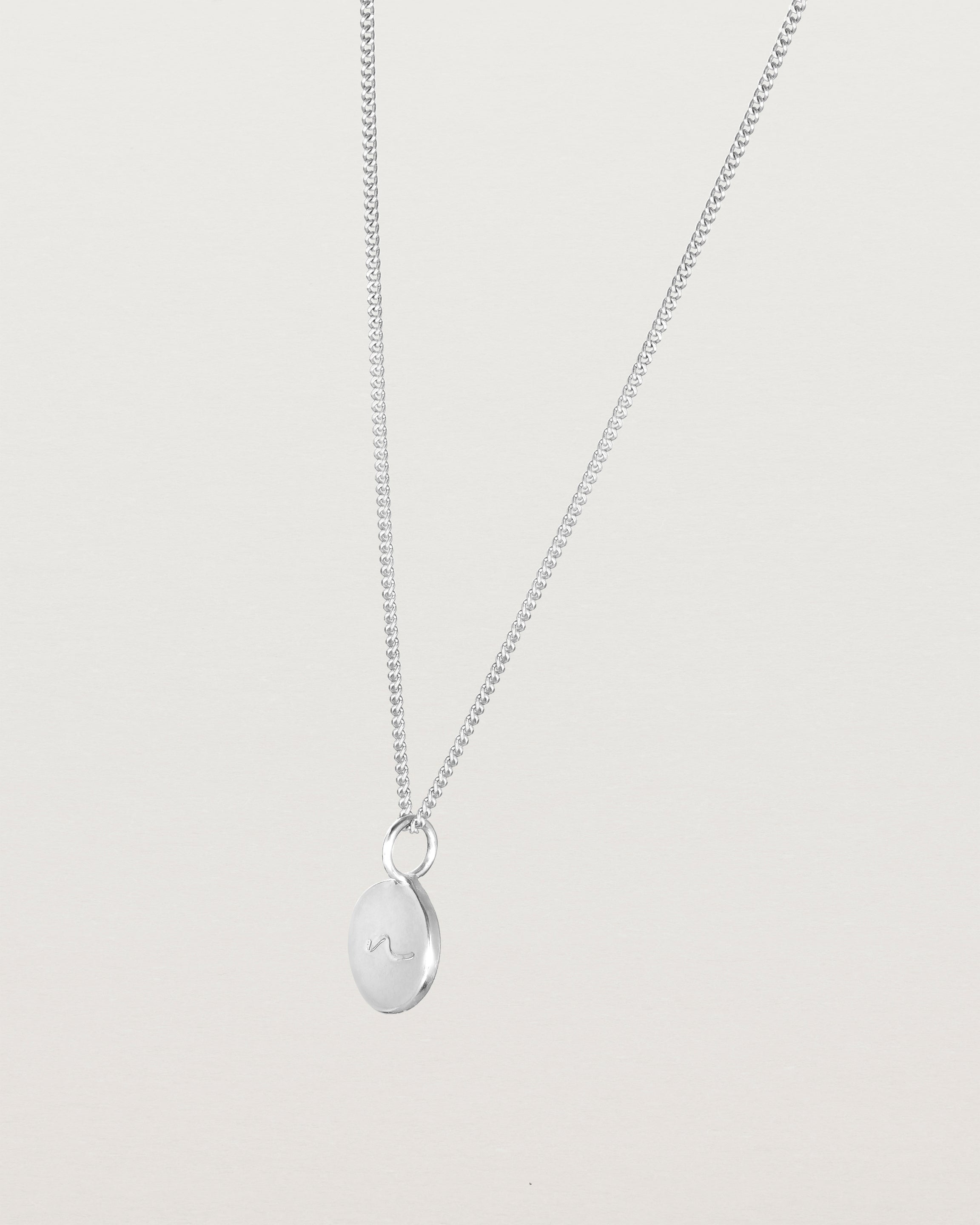 Angled view of the Mae Necklace in sterling silver.