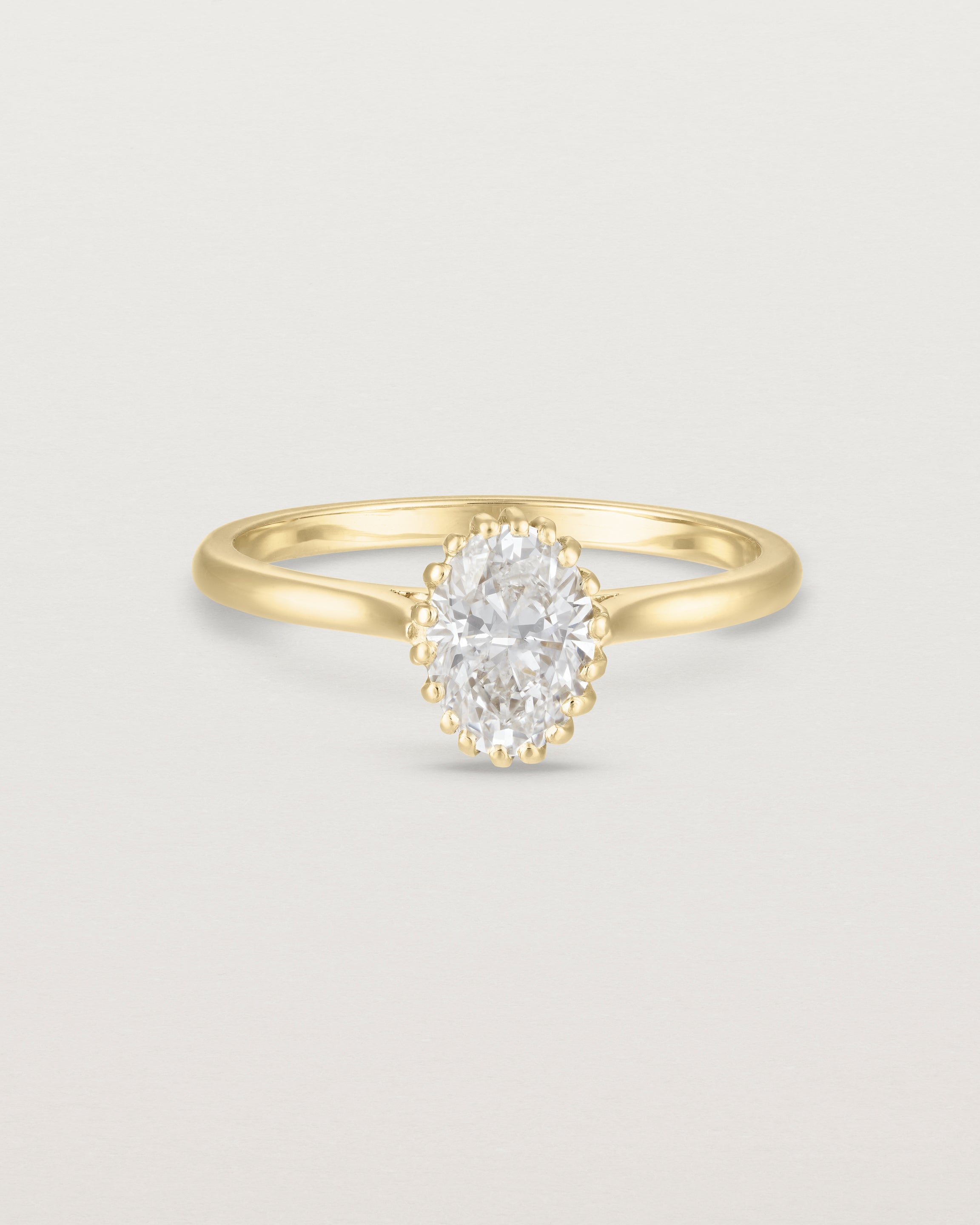 Front view of the Meroë Oval Solitaire | Laboratory Grown Diamond in yellow gold.