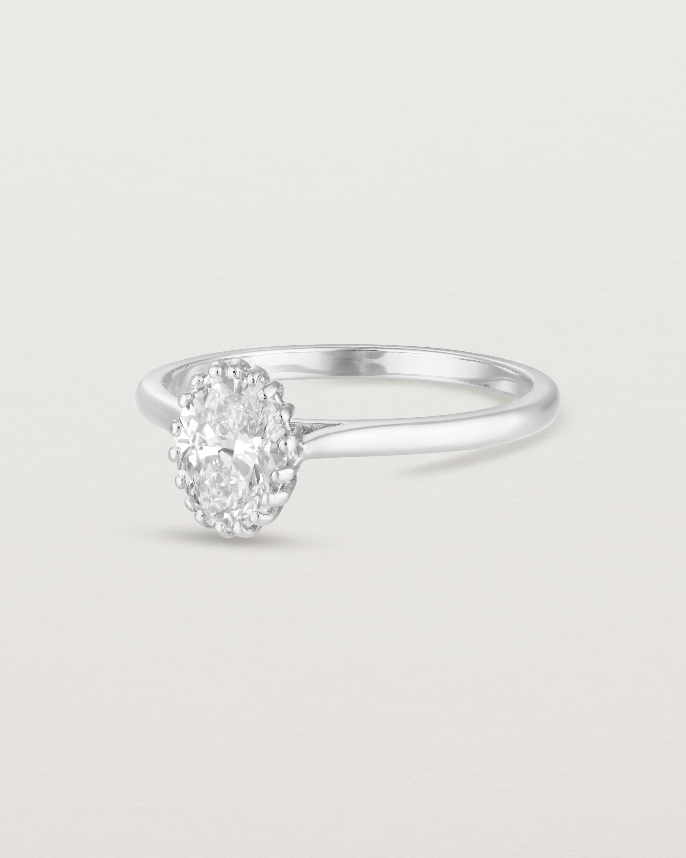 Angled view of the Meroë Oval Solitaire | Laboratory Grown Diamond in white gold.